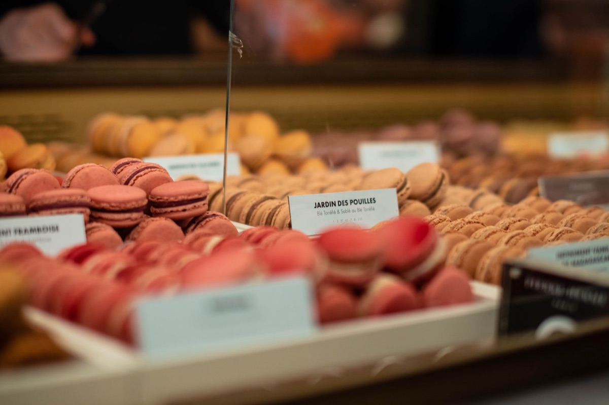 Paris bakery window displaying fresh pastries