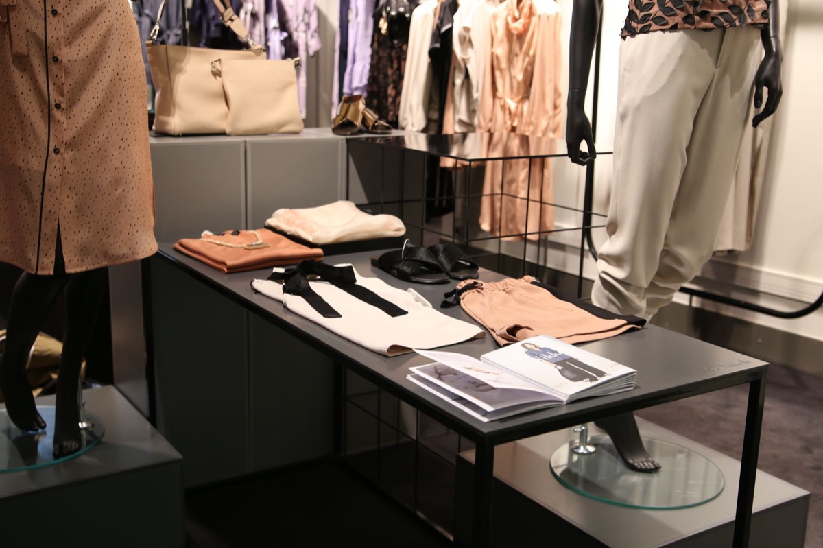 paris high-end clothing store with stylish fashion items and a clean storefront